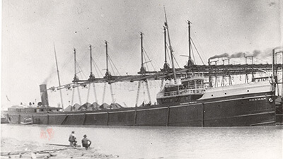 Black and white photo of a large ship