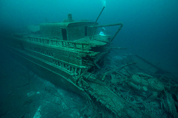 broken shipwreck at the bottom of a lake
