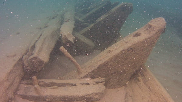 Frames and fasteners are visible at the shallow site of the Gilchrist Fleet